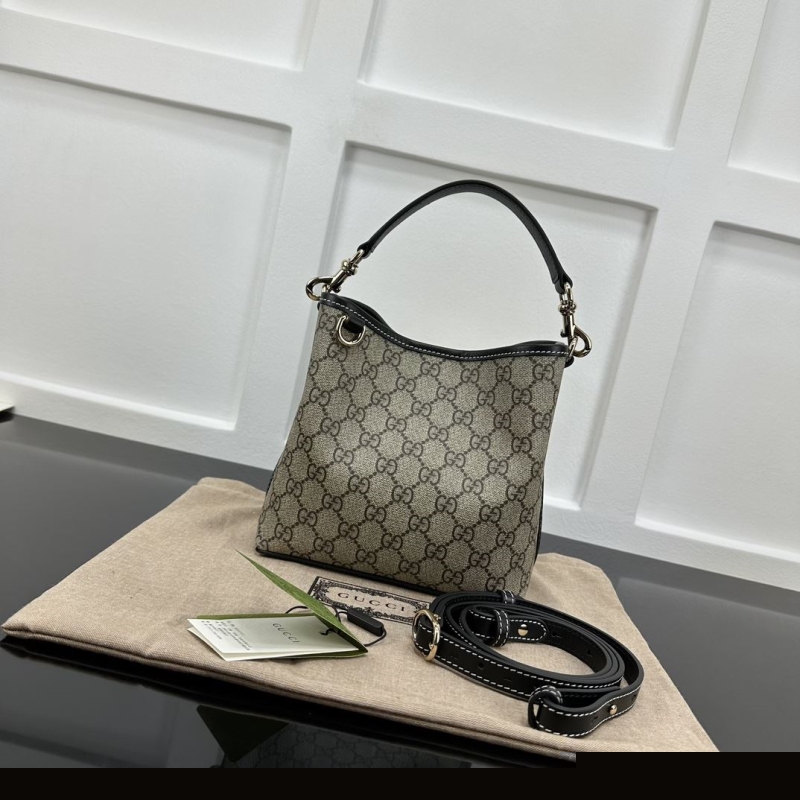 G*u*i top handle bags